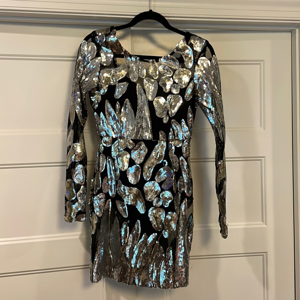 Black sheer mini dress with silver sequins, and built in bodysuit